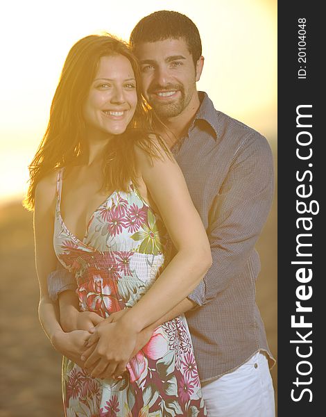 Happy young couple have romantic time on beach