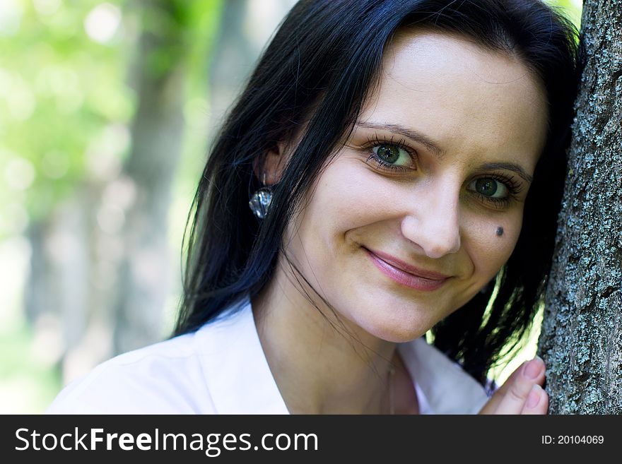 Single smiling woman outdoor,close-up. Single smiling woman outdoor,close-up