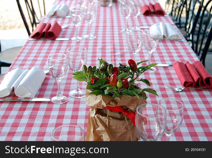 Wedding table with  pot of peppers