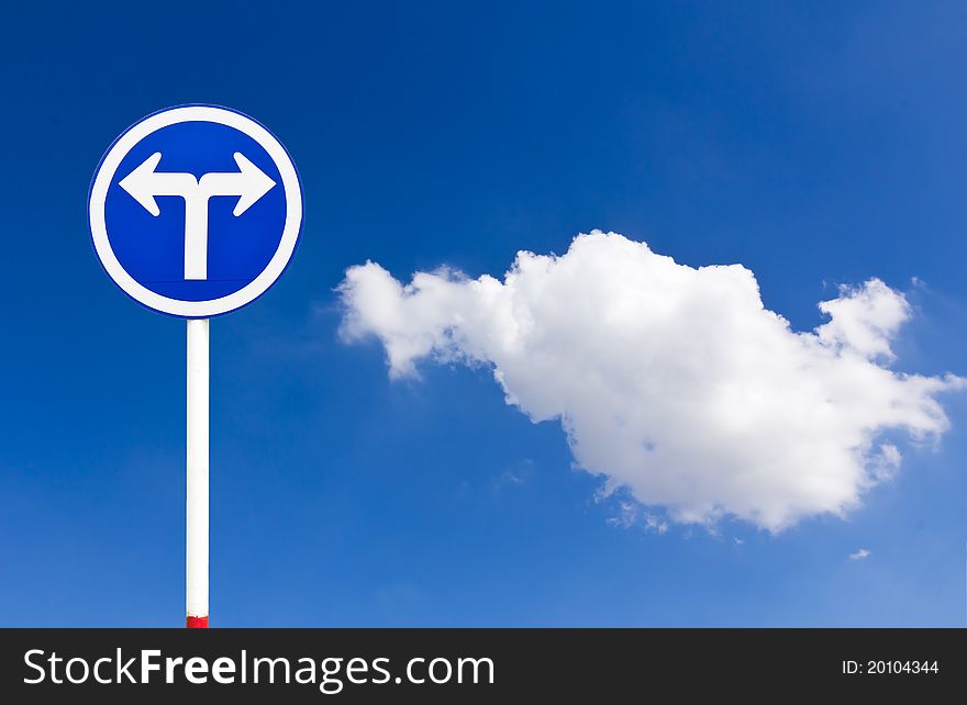 Curved Road Traffic Sign over blue sky,turn left