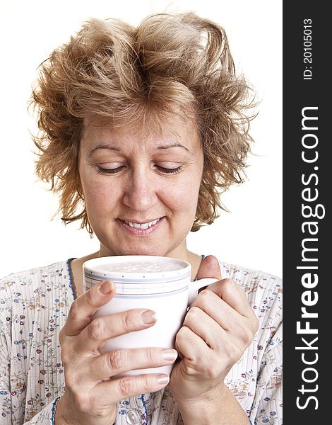 Woman waking up with a coffee (Looking at coffee)