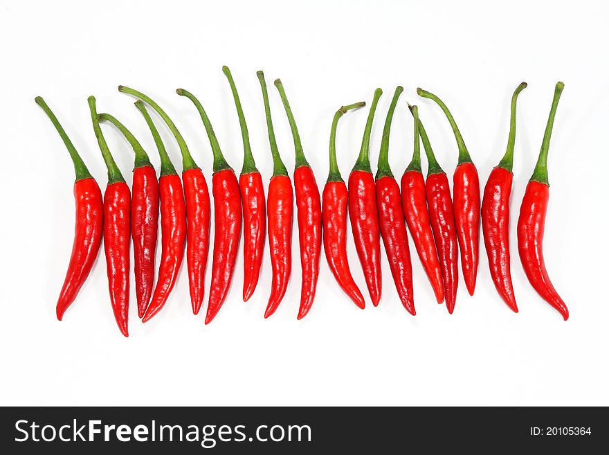 Red chili peppers on a white