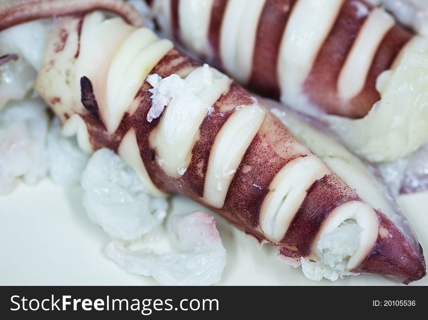 Steamed squid on white background