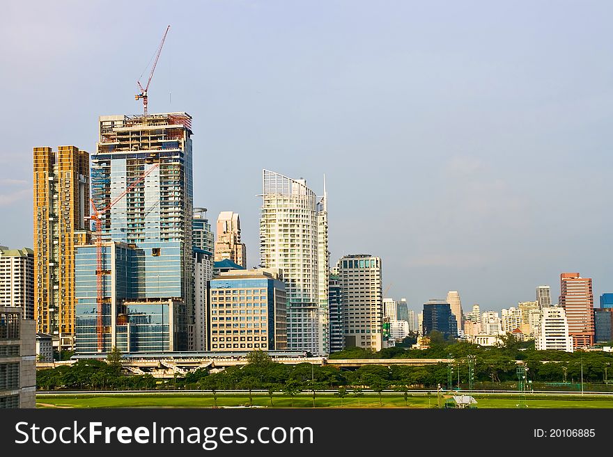 Skyscraper Office Tower  in Bangkok Thailand with green diving range