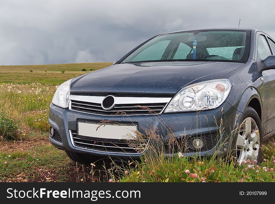 Car on the grass after the rain in Crimeam mountains. Car on the grass after the rain in Crimeam mountains