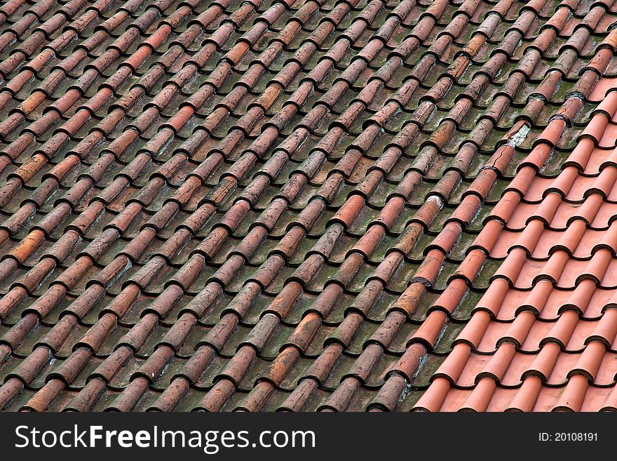 Old tile roof of an old church. Old tile roof of an old church.