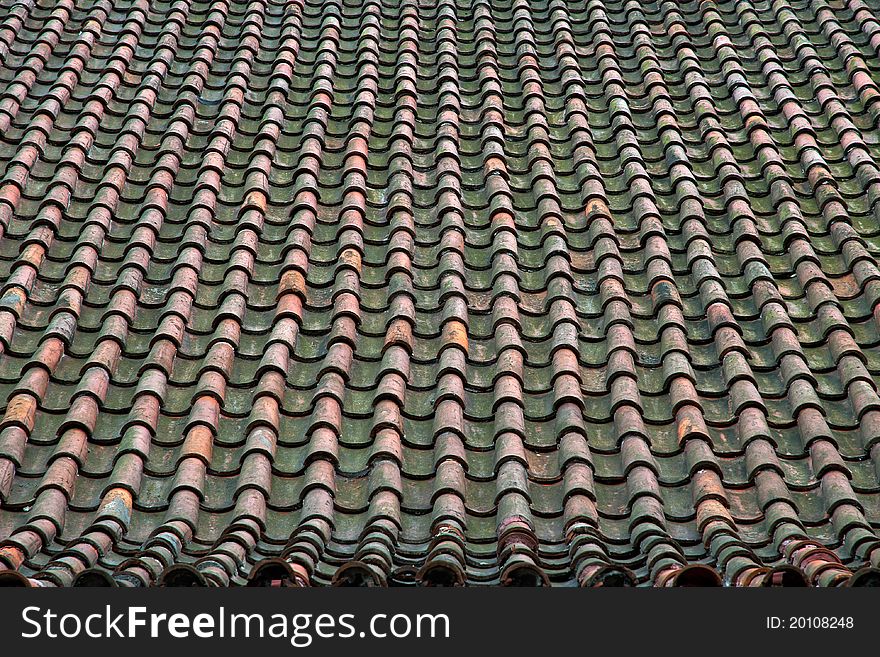 Old tile roof of an old church.