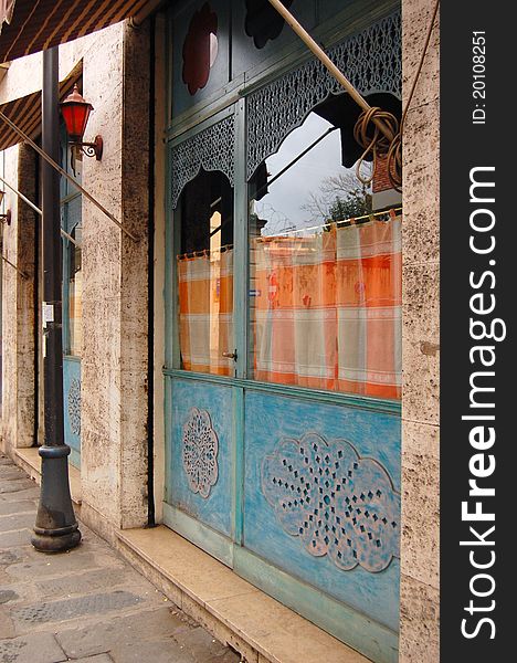 Decorated window of oriental restaurant in Pisa, Italy. Decorated window of oriental restaurant in Pisa, Italy