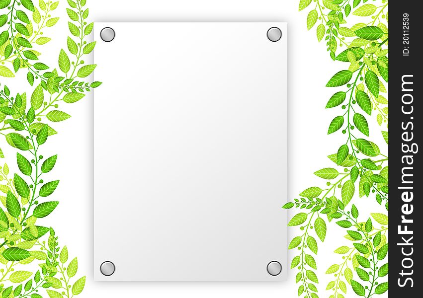 White blank paper with green leafs over white background. White blank paper with green leafs over white background