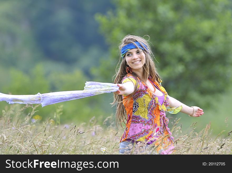 Portrait of a beautiful girl on field