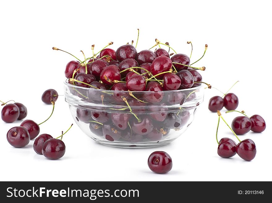 Bowl full of cherries on white background. Bowl full of cherries on white background.