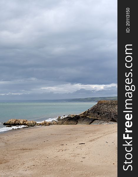 New Quay beach at low tide, looking noth to AberaeronWest Wales, united Kingdom. New Quay beach at low tide, looking noth to AberaeronWest Wales, united Kingdom