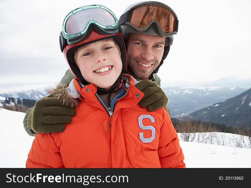 Young Father And Son On Winter Vacation smiling