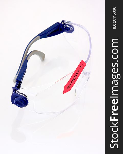 Work goggles with one colored label, on white background. Work goggles with one colored label, on white background