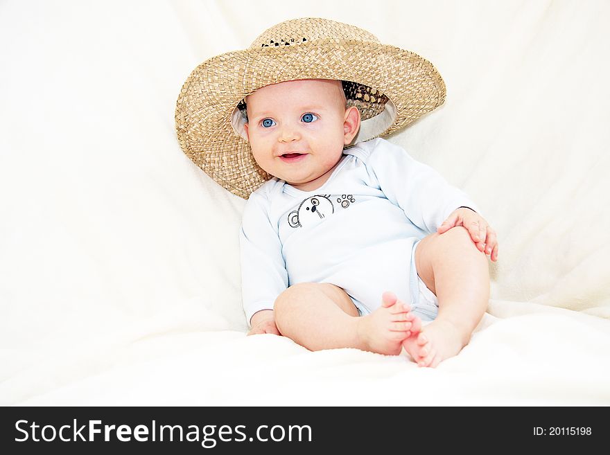 Little boy with blue eyes and hat. Little boy with blue eyes and hat