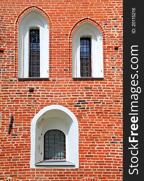 Window in red brick wall