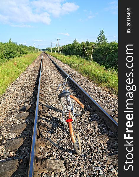 Old bicycle on railway