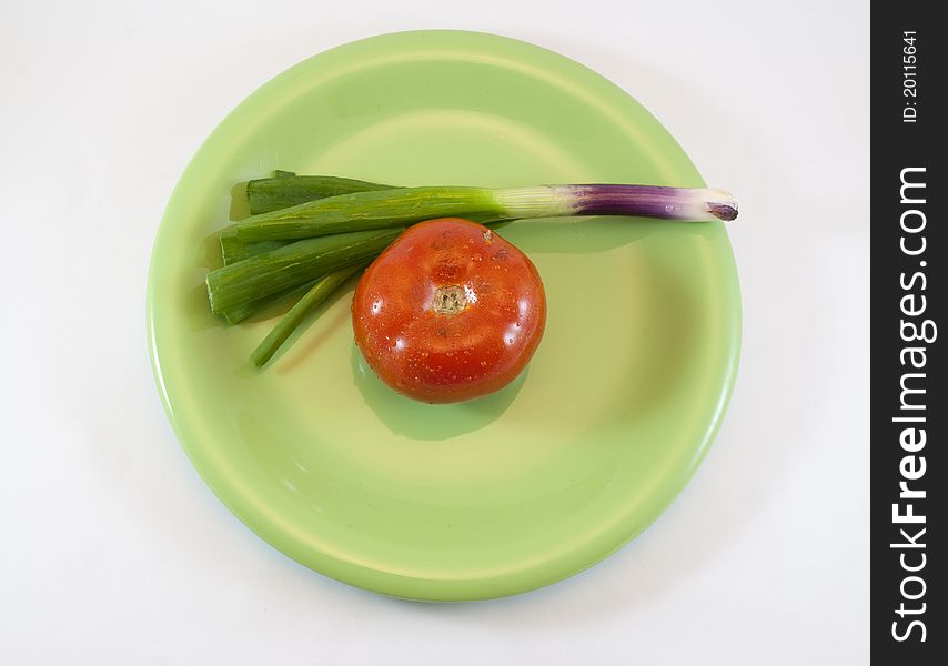 Tomato and onion dish with white background isolated. Tomato and onion dish with white background isolated