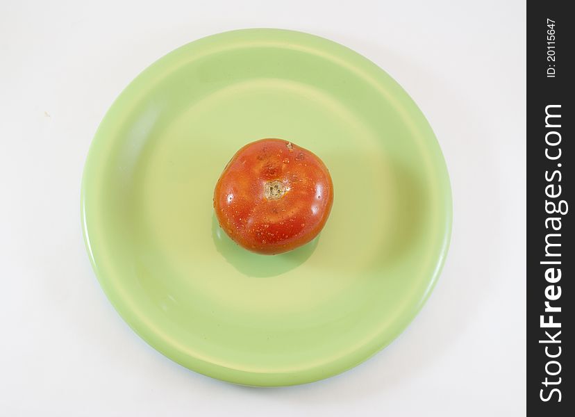 Dish with tomato isolated on white background. Dish with tomato isolated on white background