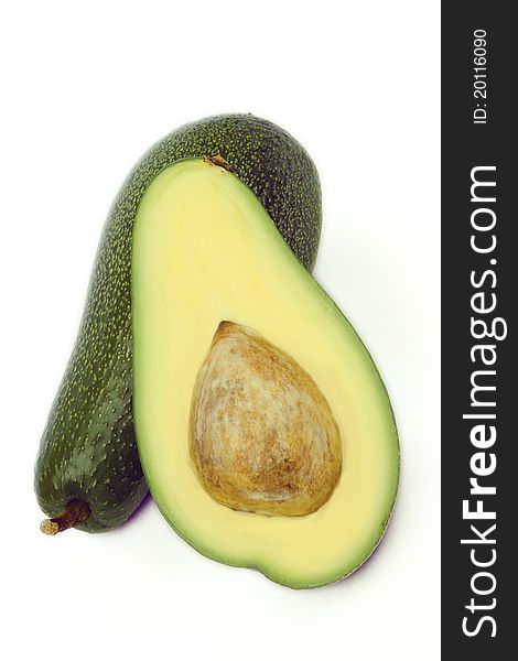 Seed and avocado with white background. Seed and avocado with white background