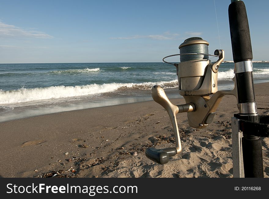 Sea fishing off the beach with a rod