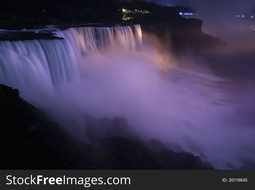 Photo overlooking the American Falls in Niagara at night, New York. Photo overlooking the American Falls in Niagara at night, New York