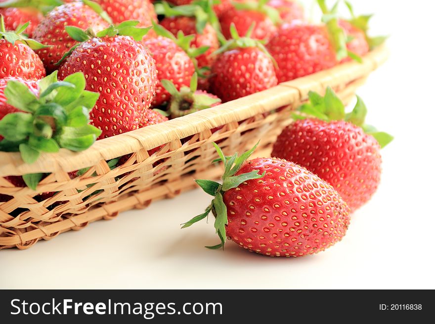 Fresh, juicy and healthy strawberries, red on white