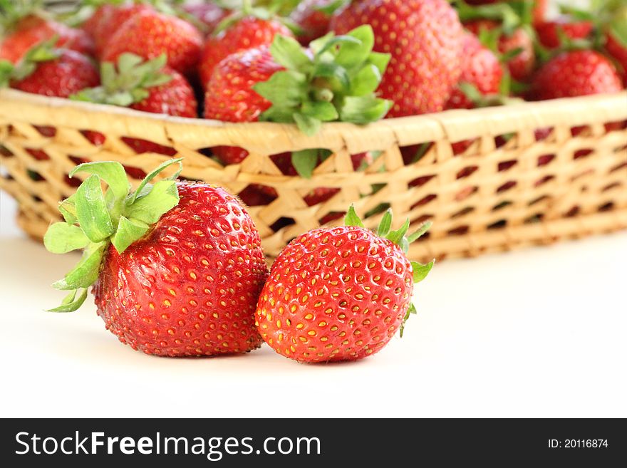 Fresh, juicy and healthy strawberries, red on white