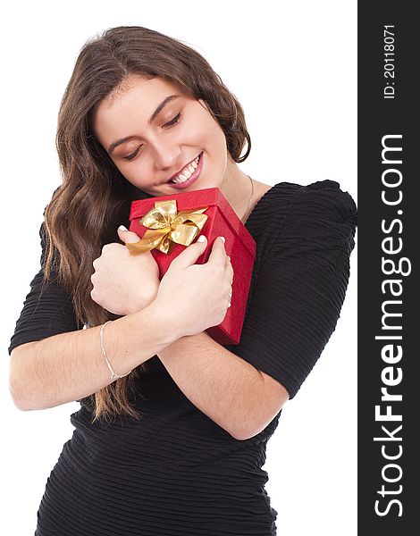 A beautiful woman smiling and holding a gift red box. A beautiful woman smiling and holding a gift red box