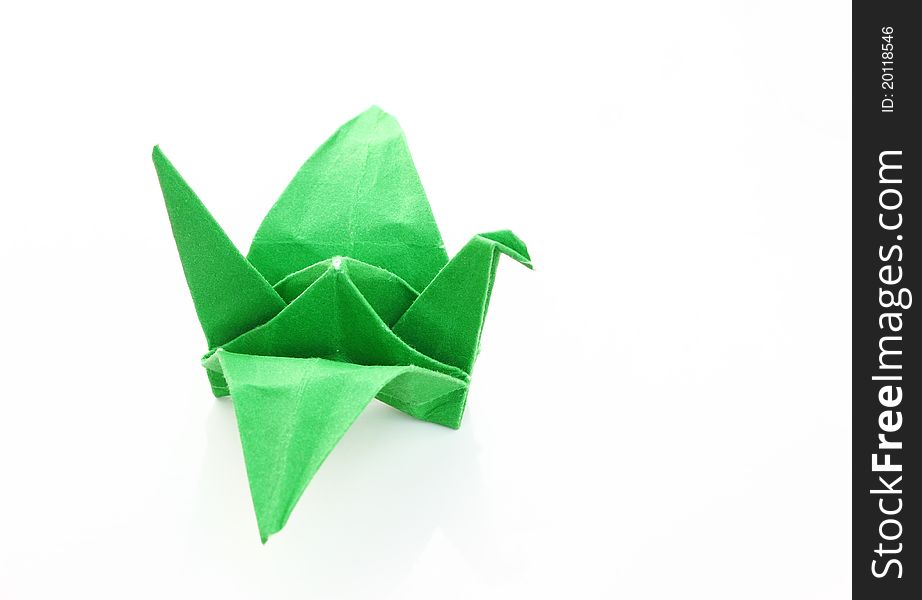 Green Origami bird isolate on white background. Green Origami bird isolate on white background