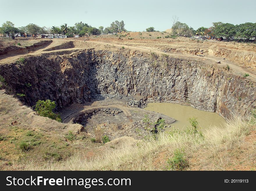 June 29,2011 Rampurhut,West Bengal,India,Asia-A horizontal view of a open cast mine. June 29,2011 Rampurhut,West Bengal,India,Asia-A horizontal view of a open cast mine.