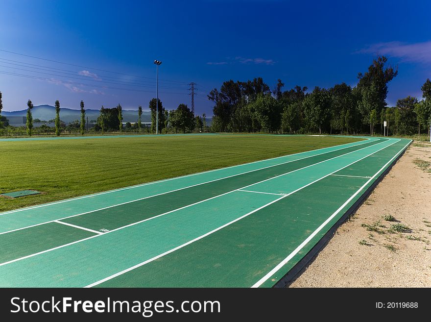 Athletics track green, located in Barcelona. Athletics track green, located in Barcelona