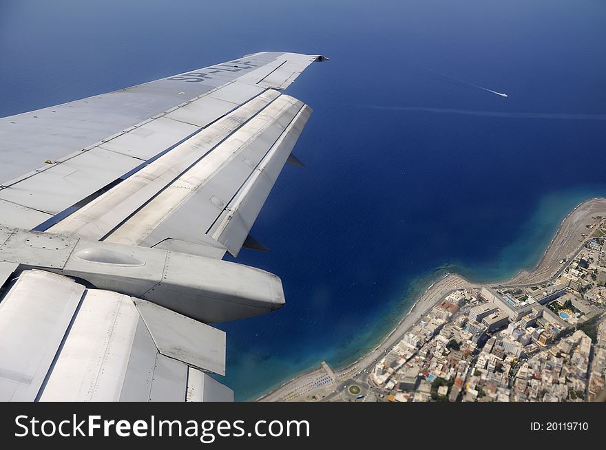 Island resort through window of an aircraft