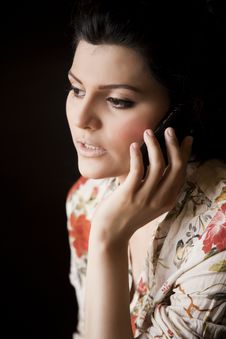 Attractive Girl Talking Over The Cell Phone. Royalty Free Stock Photo Attractive Girl Talking Over The Cell Phone. Royalty Free Stock Photo