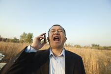 Man Screaming On The Phone Royalty Free Stock Photos