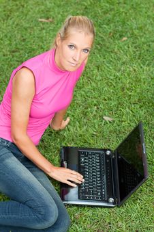 Young Attractive Woman Works On Her Laptop Stock Photo Young Attractive Woman Works On Her Laptop Stock Photo
