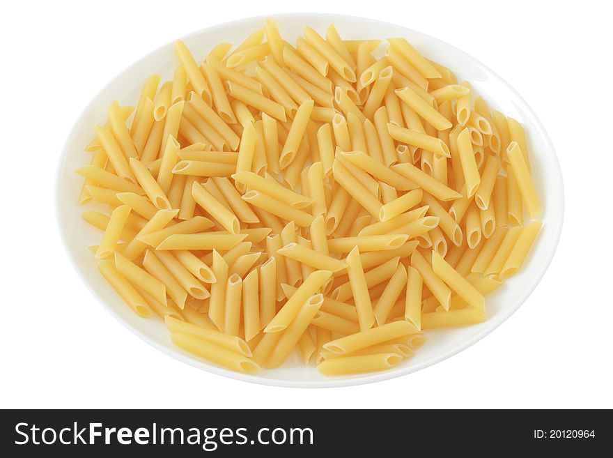 Dry penne on an white plate. Dry penne on an white plate