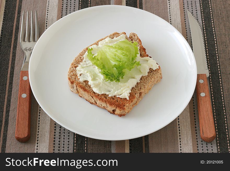 Toast With Cream Cheese On A Plate