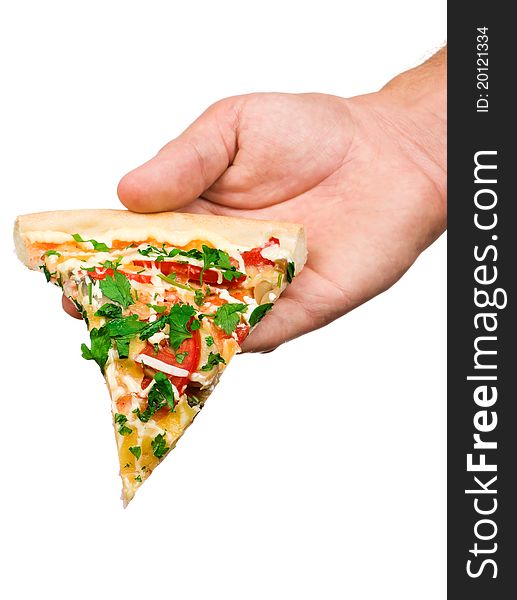 Hand holding cut off slice pizza isolated on white background