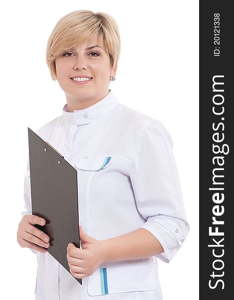 Portrait of smiling female doctor holding a clipboard - isolated over a white background