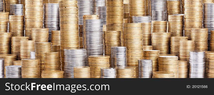 Many ukrainian coins stacks background