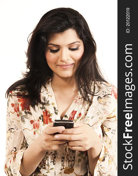 Attractive Indian Girl Using Her Cell Phone.