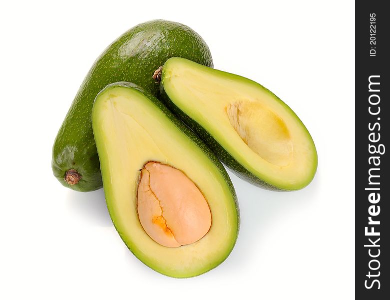 Ripe sliced avocado isolated on white background