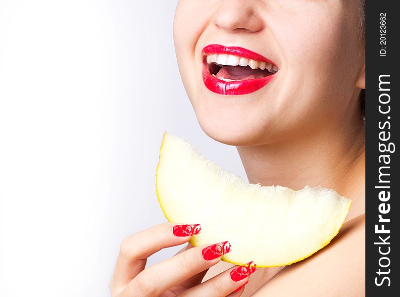 Beautiful smiling woman with lobule of melon. Beautiful smiling woman with lobule of melon