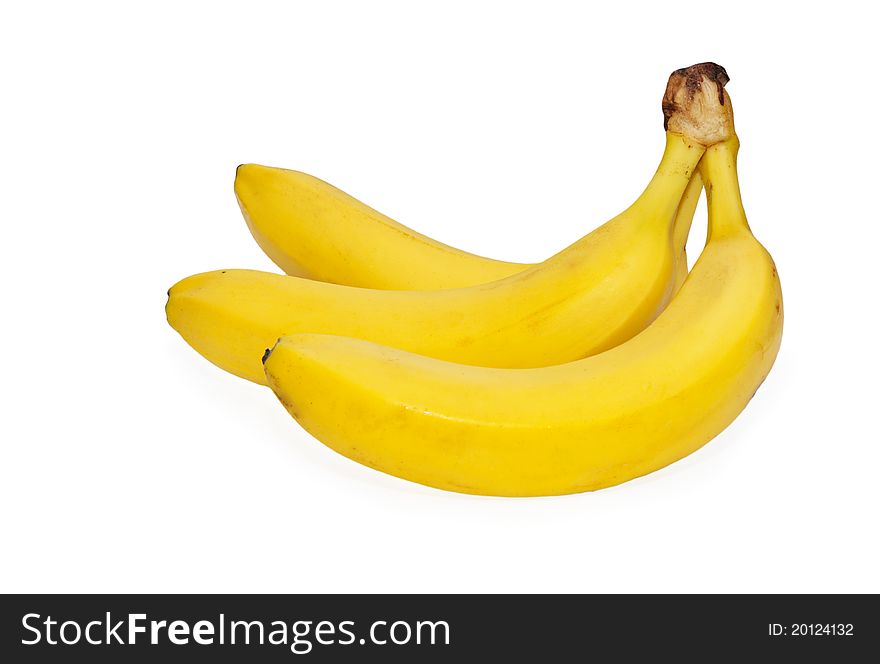Three bananas over white background