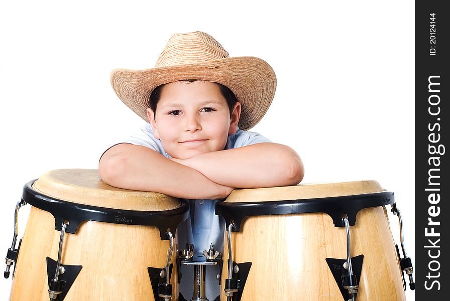 A boy wearing a hat with the drums on a white background. A boy wearing a hat with the drums on a white background