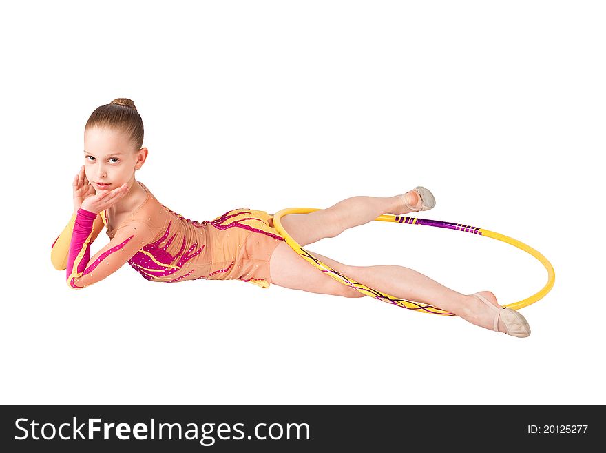 The young gymnast performs exercises with a hoop, the isolation on white