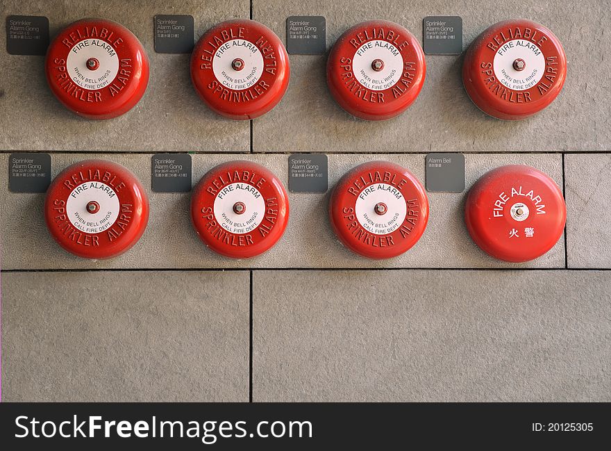 8 red alarms on the wall. 8 red alarms on the wall