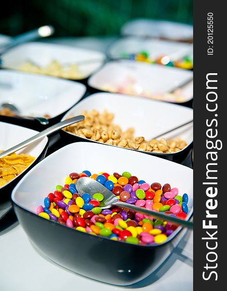 Colorful Candies and Cereals in different Bowls. Colorful Candies and Cereals in different Bowls