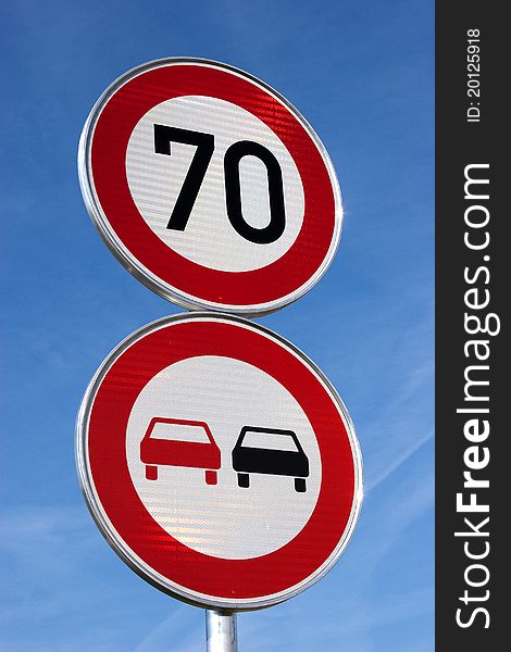 German traffic sign. Do not overtake. Speed limit 70 kmh. German traffic sign. Do not overtake. Speed limit 70 kmh